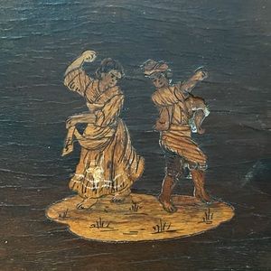 Wooden box. Dancing couple on lid.